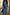 Thumbnail for Teal Vegan Leather Jaspre wrap skirt styled with a blue button-up shirt and brown suede bag.
