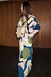 Teal Mara Abstract Cheryl Cardigan featuring a pink and green artist print, worn as a co-ord with a matching maxi skirt.