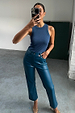 Teal Vegan Leather Trousers in a straight leg cut, styled with a blue rib tank top in a mirror selfie.