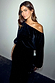 Black Velvet Tilly Dress with silver studs and an off-the-shoulder neckline on a model.