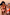 Thumbnail for Orange Sun High Waist Bikini Brief featuring iconic sun motifs and fine line print on two models.