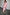 Thumbnail for Vestito midaxi Tilly in maglia a coste rosa glitterata con scollo ampio, cintura e clutch rosa.