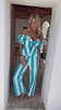 Multi-wear Blue Stripe Kiki Top with puff sleeves and peplum hem, styled with matching trousers.