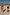 Thumbnail for Orange Sun Tie Side Bikini Brief with soleil motifs, styled on a beach with matching family swimwear.