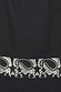 Close up of the black star lace cutout detail on the cotton Sasha Dress.