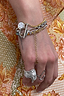 Thumbnail for Bespoke Chain Bracelet with a silver T-bar closure, styled with stacked jewellery on a model's wrist.