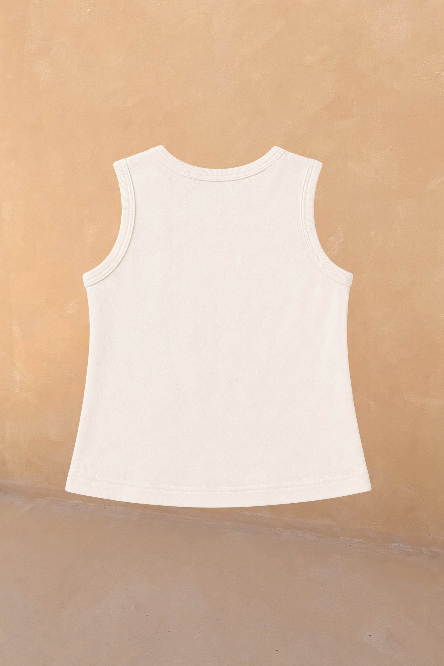 Back view of the cream cotton sleeveless vest from the Girl's Yellow Sun Set, designed in London.
