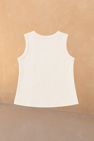 Back view of the cream cotton sleeveless vest from the Girl's Yellow Sun Set, designed in London.