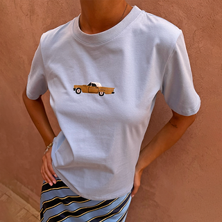 Blue Cadillac Baby T-Shirt featuring a retro car motif, a stretch cotton wardrobe staple.