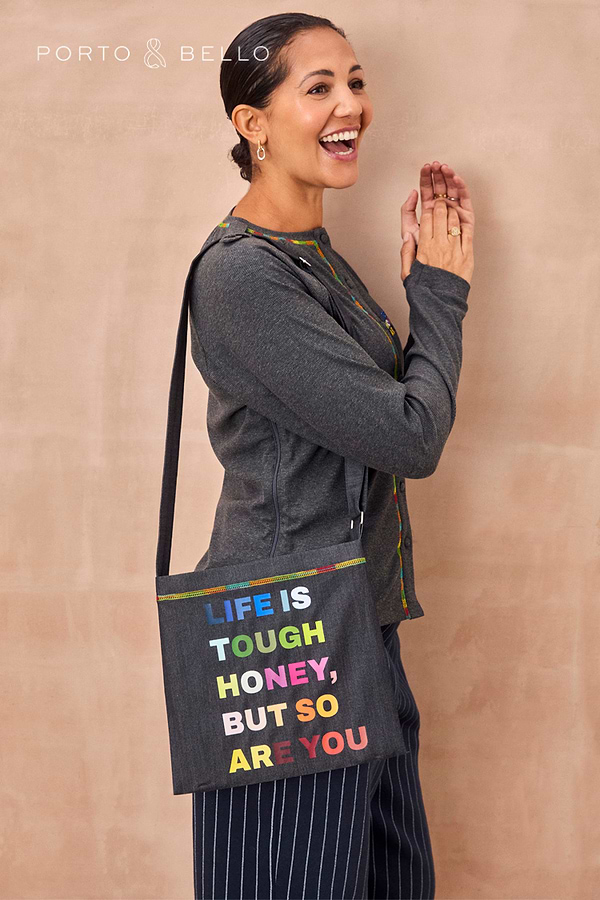 Charcoal Life is Tough Honey Drainage Bag featuring a rainbow slogan print and a comfortable shoulder strap.