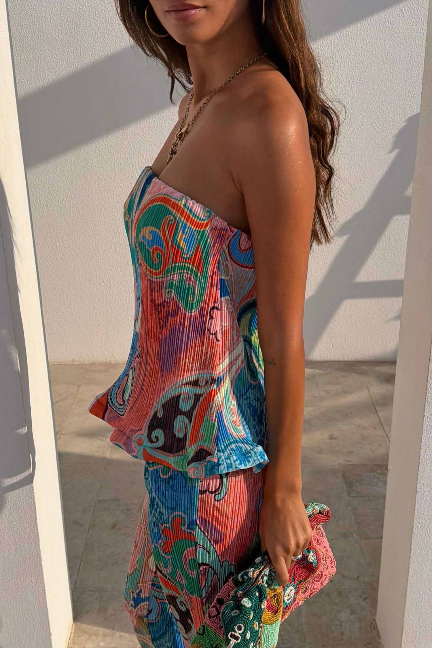 Blue Mari Plisse Bandeau Top in a pastel paisley print with plisse fabric and an elasticated hem.