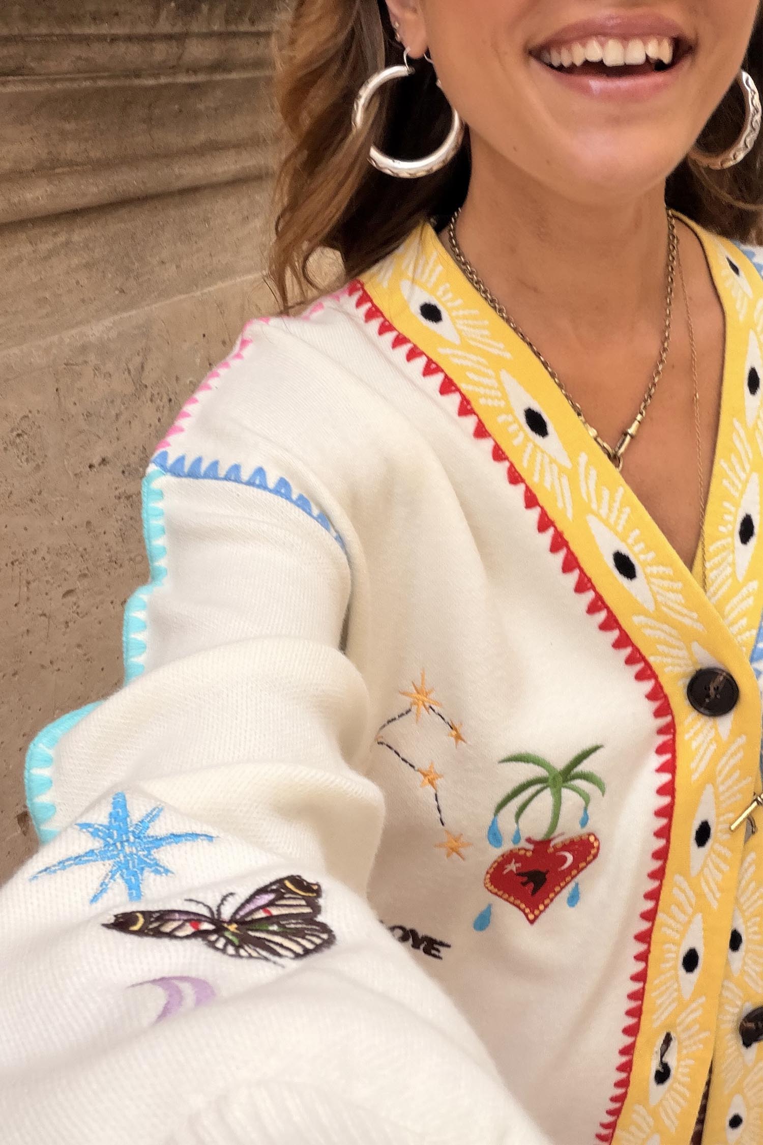 Cream Celestial Martha Cardigan in soft touch knit with butterfly, constellation and heart motifs.