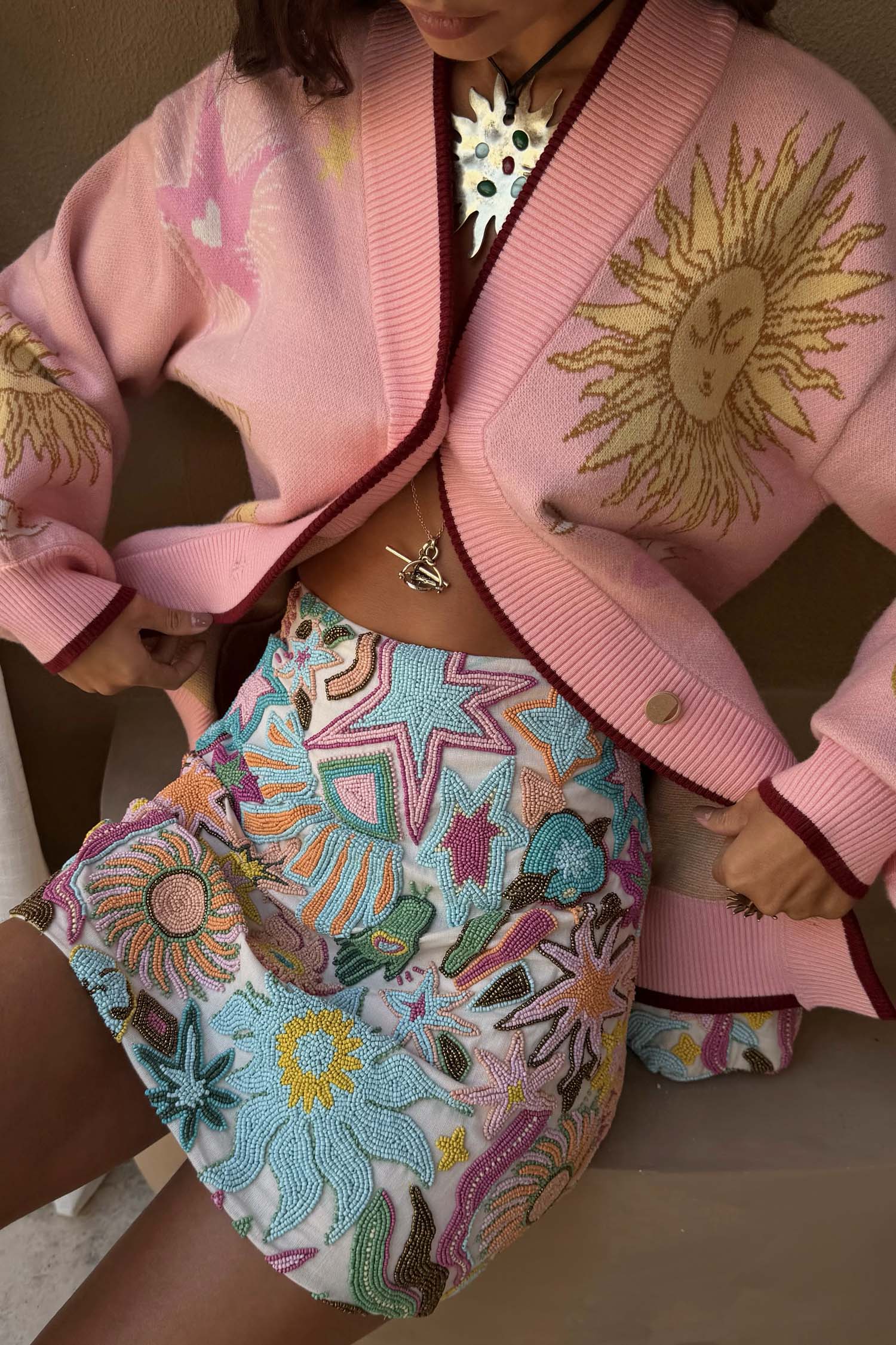 Star Beaded Dreamer Skirt featuring hand-embroidered glass bead sun and star motifs in pastel tones.