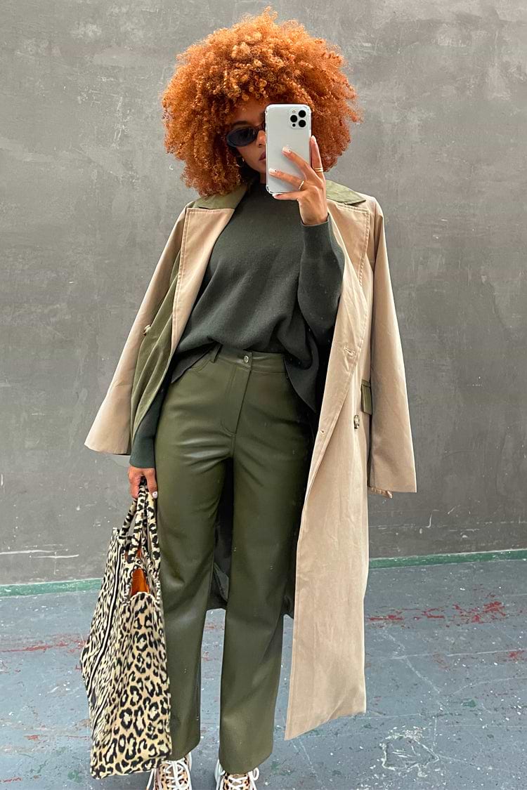 Khaki Vegan Leather Trousers paired with a beige trench coat and leopard print bag for a London look.