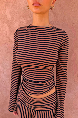 Ribbed Chocolate Stripe Top with a high neck and long sleeves, paired with matching striped trousers.