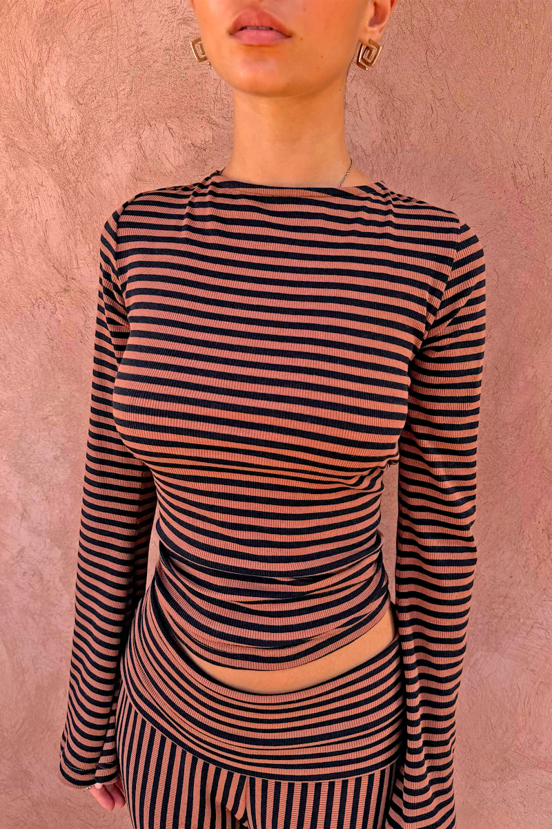 Ribbed Chocolate Stripe Top with a high neck and long sleeves, paired with matching striped trousers.