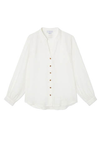 Oversized white Miley shirt featuring blouson sleeves and contrast tortoise buttons in a luxe, lightweight fabric.