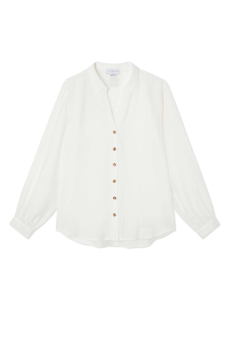 Oversized white Miley shirt featuring blouson sleeves and contrast tortoise buttons in a luxe, lightweight fabric.