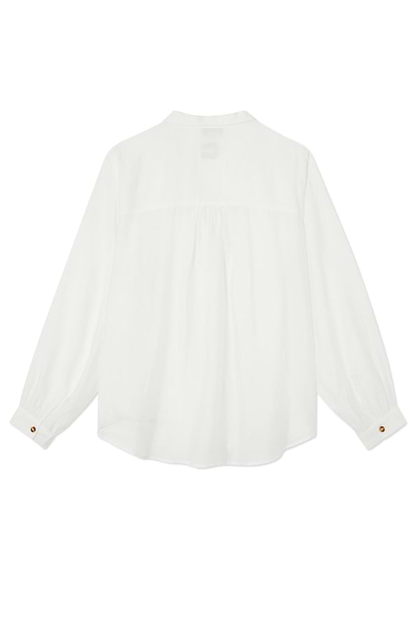 Oversized White Miley Shirt seen from the back, featuring blouson sleeves and contrast tortoise button cuffs.