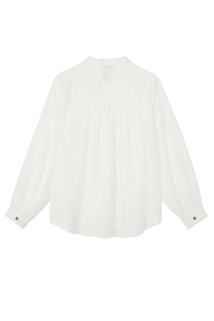 Oversized White Miley Shirt seen from the back, featuring blouson sleeves and contrast tortoise button cuffs.