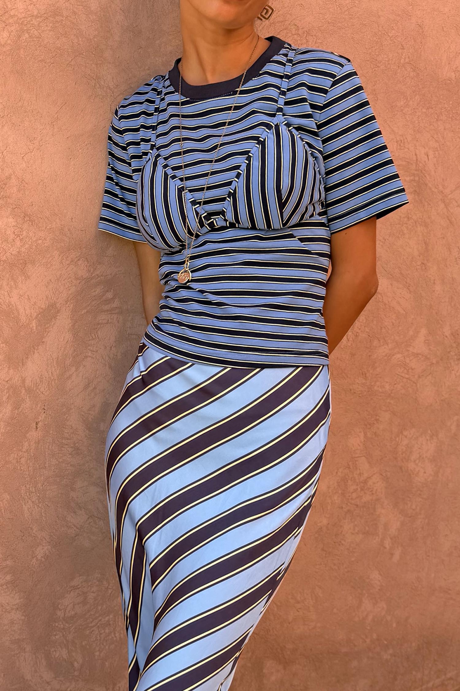 Blue Stripe Bra Baby T-Shirt featuring a detachable bra overlay and matching striped skirt co-ord.
