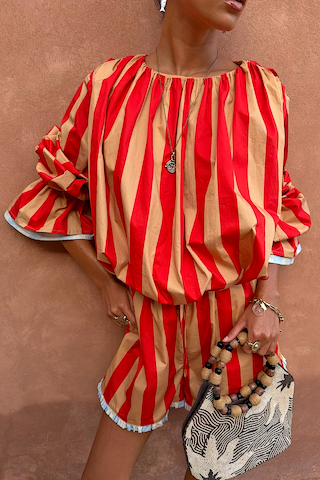Tomato Stripe Blouse in red and camel stripes with voluminous sleeves and gathered neckline, styled as a vacation co-ord.