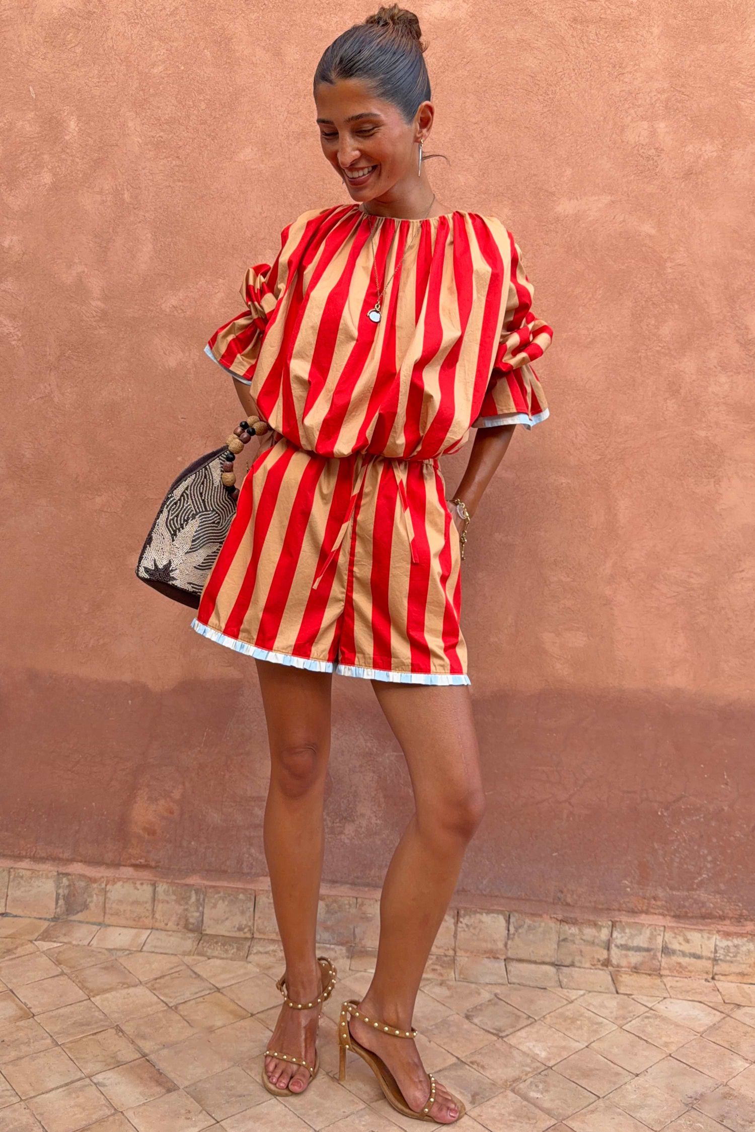 Red and camel striped cotton Tomato Stripe Blouse with voluminous sleeves and matching co-ord shorts.