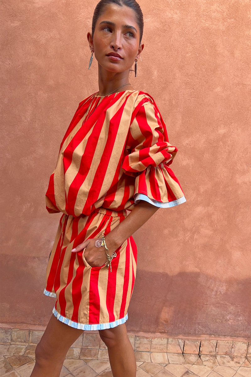 Tomato Stripe Ellie Shorts and matching co-ord blouse in red and camel stripes with blue contrast trims.