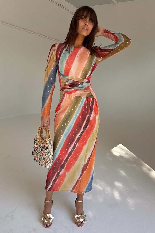 Sunset Stripe Mesh Midi Dress in a multicoloured silky mesh with a wrap tie waist and long sheer sleeves.