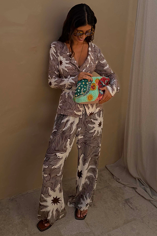Chocolate Soleil Ellie Trousers and Alex Cardigan co-ord featuring a sun motif print and line detailing.