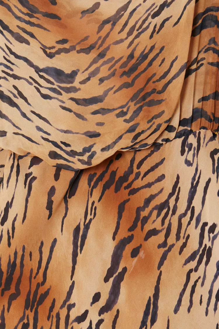 Animal Tilly Dress detail highlighting the tiger print in brown and black on sustainable viscose fabric.