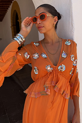 Apricot Embellished Ines Dress in orange with mirror detailing and a peplum hem.