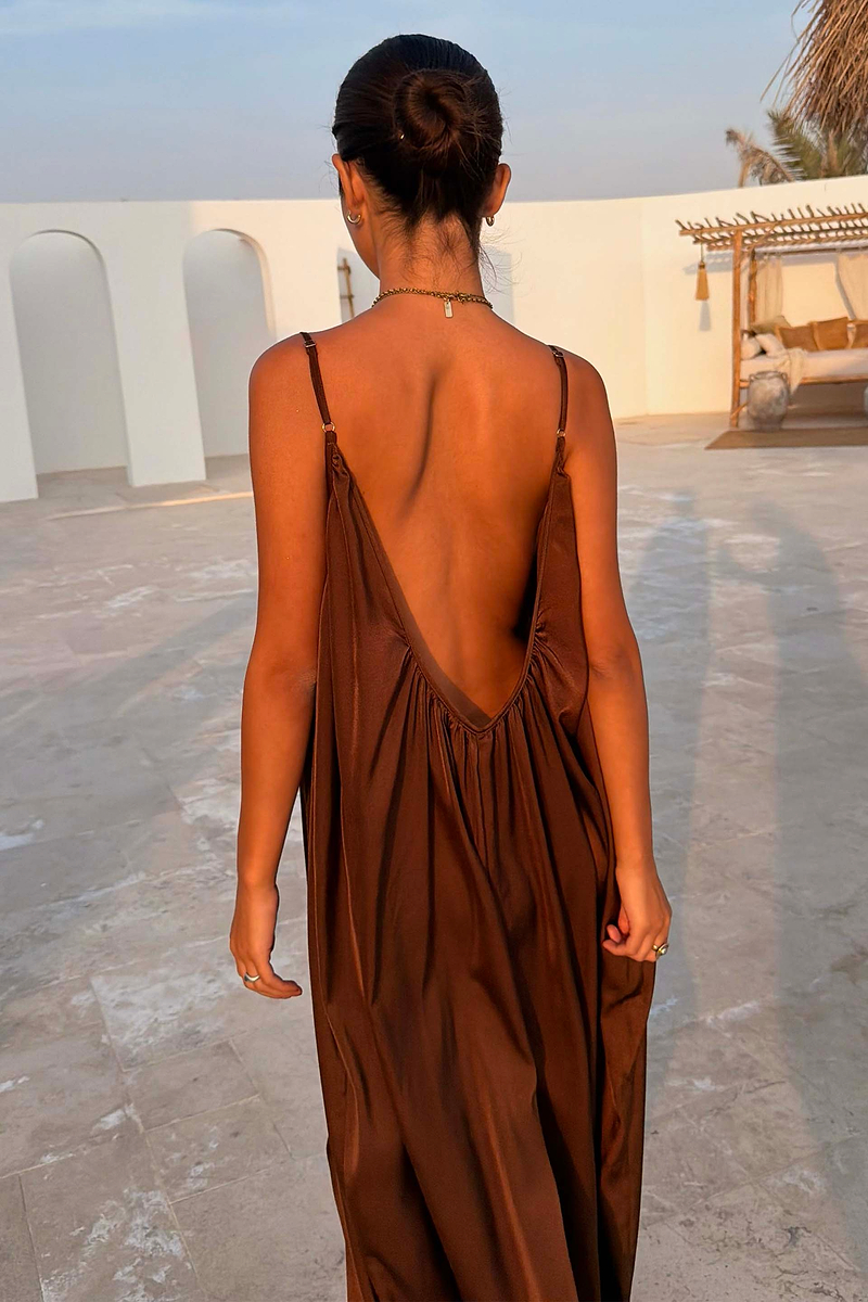 Chocolate Balloon Jumpsuit featuring a deep V back, gathered detail and slim straps in a draped silhouette.