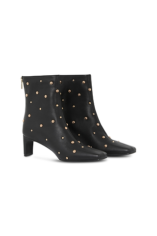 Black leather boots with all over gold studs, featuring a square toe, thin block heel, and back gold zip fastening.