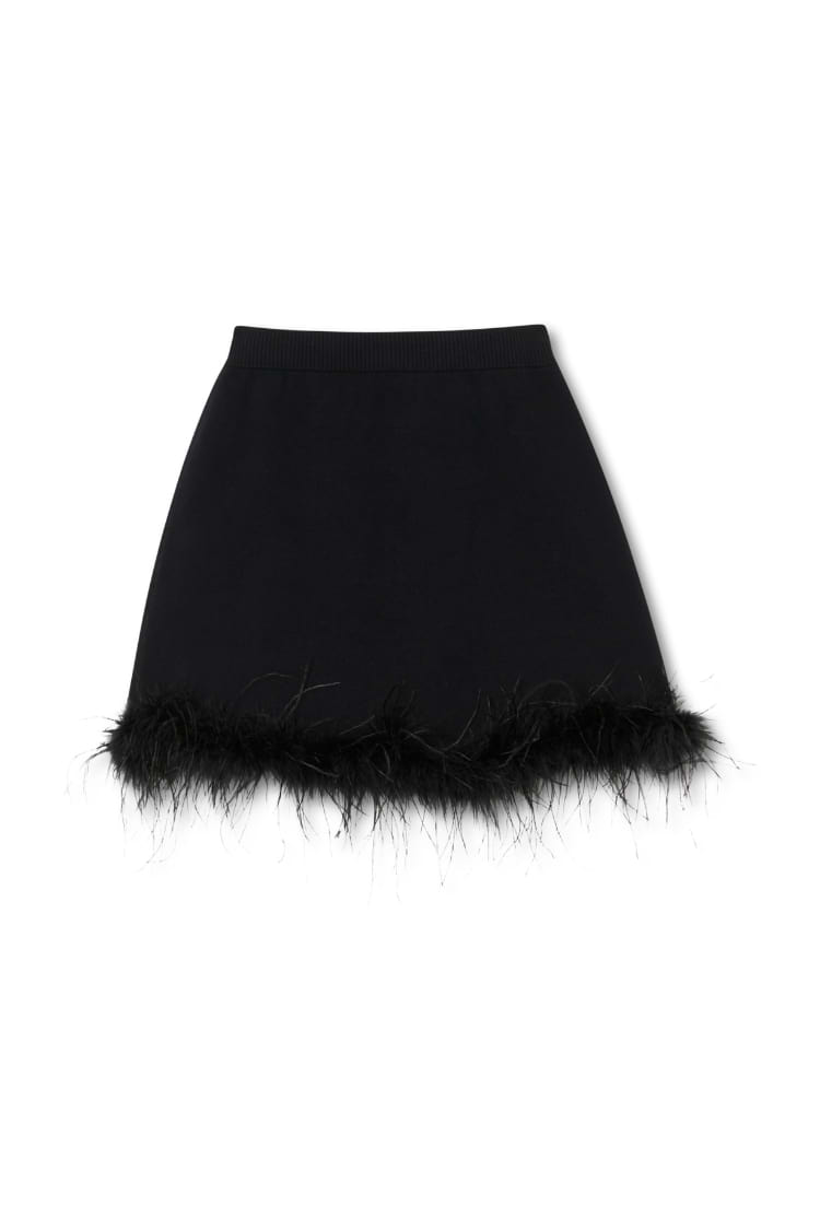 Black Jake Skirt with a detachable feather trim, featuring a weighty knit fabric and an elasticated waistband.