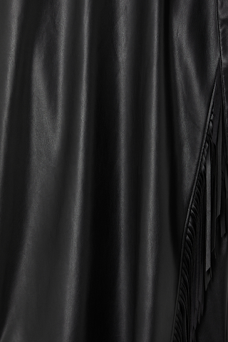 Black vegan leather and fringe detailing on the iconic Mini Jaspre Skirt.