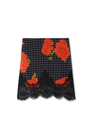 Black Poppy Mini Maeva Skirt with red poppy floral print, white polka dots and a black lace border.