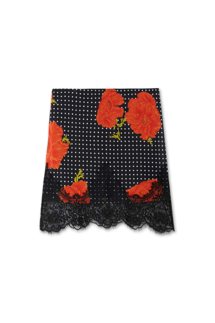 Black Poppy Mini Maeva Skirt with red poppy floral print, white polka dots and a black lace border.