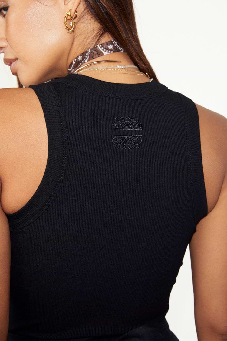 Black Ribbed Tank with an embroidered NFD logo on the back, a wardrobe staple in stretch ribbed fabric.