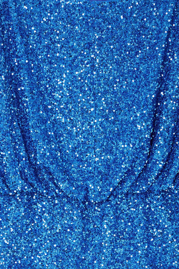 Blue Sequin Tilly Top detail highlighting the shimmering blue sequins and textured fabric.