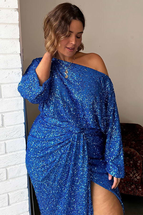 Blue Sequin Tilly Top styled off the shoulder with a matching skirt, showcasing inclusive curve fashion.