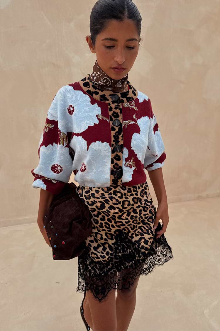 Burgundy & Blue Poppy Cardigan with leopard print trim, styled with a leopard lace skirt and brown neck scarf.