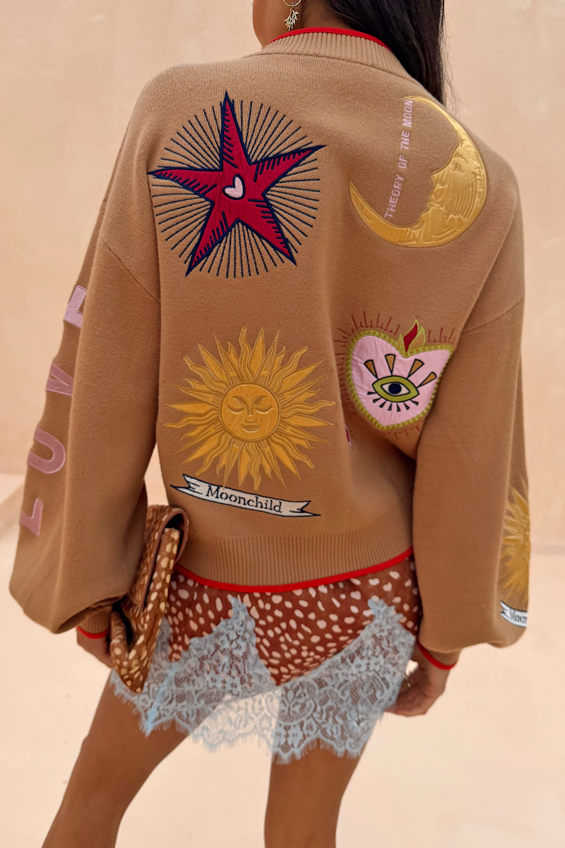 Camel Mystical Cardigan featuring embroidered sun and moon motifs on the back.
