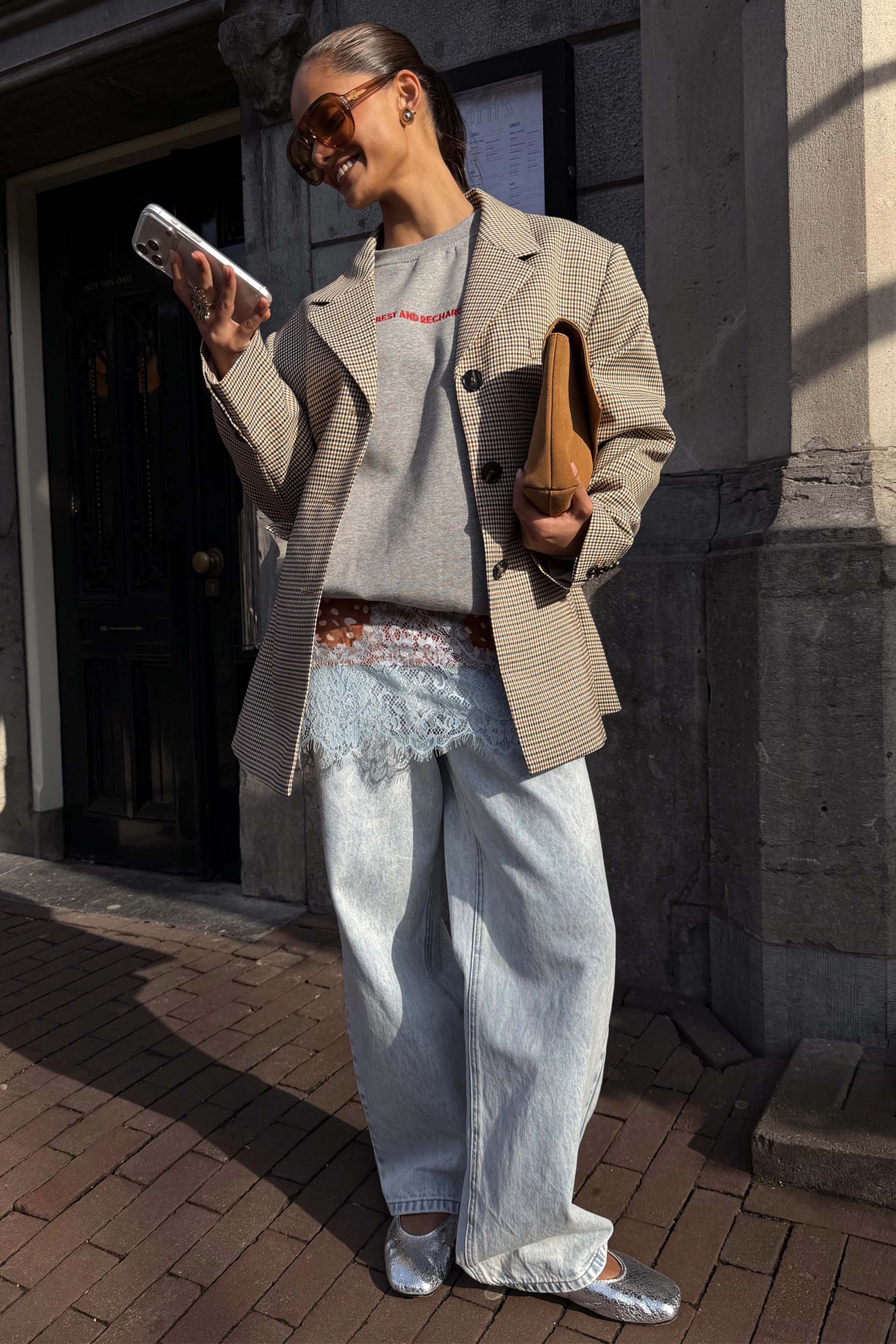 Tailored Grey Check Blazer designed in London, styled with baggy jeans for a layered street style look.