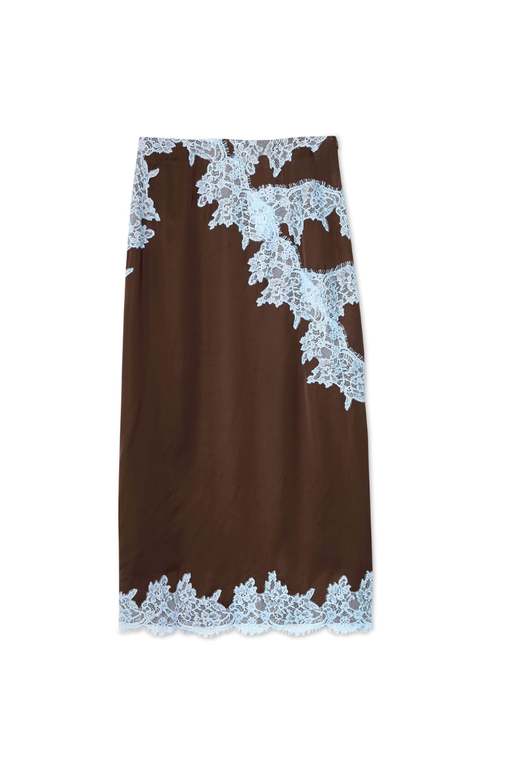 Chocolate Lily Midi Skirt in brown satin featuring intricate blue lace trim along the front and hem.