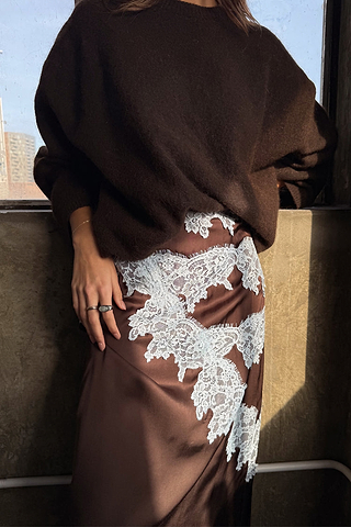 Chocolate Lily Skirt in satin with light blue lace detailing, styled with a cosy brown jumper.