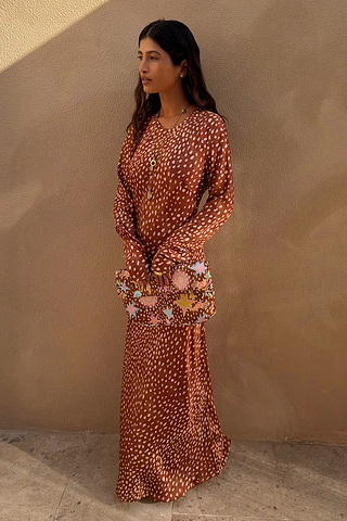 Iconic Fawn Soho Dress in a blush and cream deer print with long flared sleeves and a satin-esque finish.
