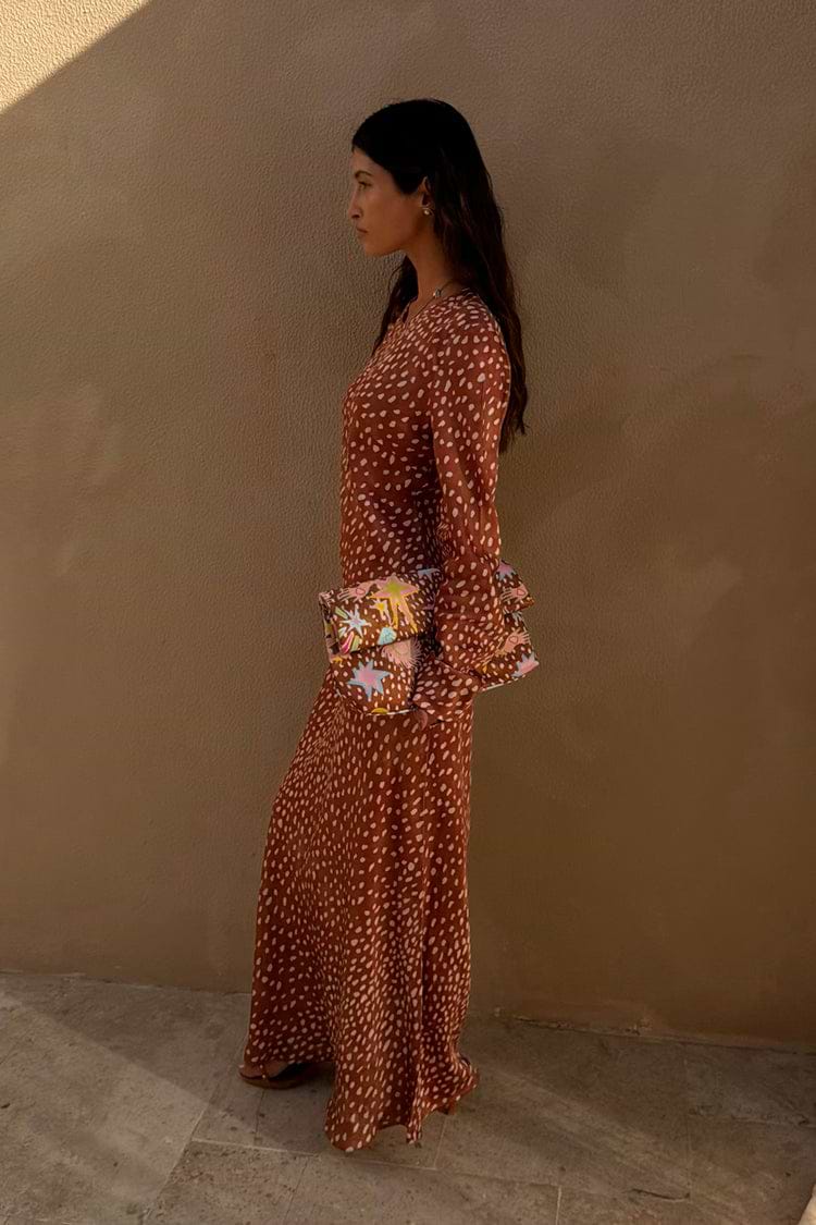 Fawn Soho Dress in brown and cream spotted deer print with flared long sleeves and a maxi silhouette.