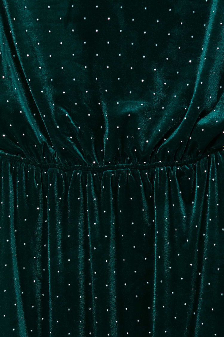 Emerald Velvet Tilly Dress detail featuring green velvet fabric with sparkling silver dots and a gathered waist.