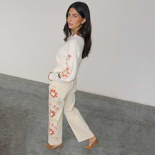 Ecru Enchanted Cut Work Scallop Jeans with sun embroidery and wide-leg fit, paired with a matching cardigan.